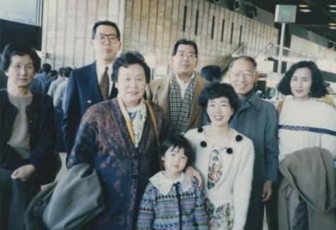 Tasaki family photo taken in Toyko, Narita Airport before Takanobu Tasaki's departure to Chicago. Depicted left to right: Fumiko Nakano, Takanobu Tasaki, Etsuki Tasaki, Hidenobu Tasaki, Seiko Tasaki, Shigueru Tasaki, and Mari Tasaki. Aya Tasaki is the young girl in the front.